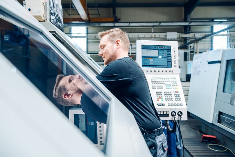 5-axis CNC machining center cutting metal